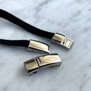 Magnetisk lås til snørebånd