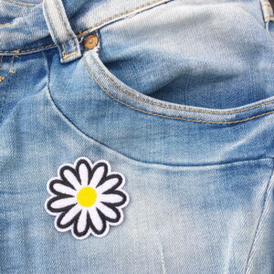 Prästkrage på jeans - tygmärke